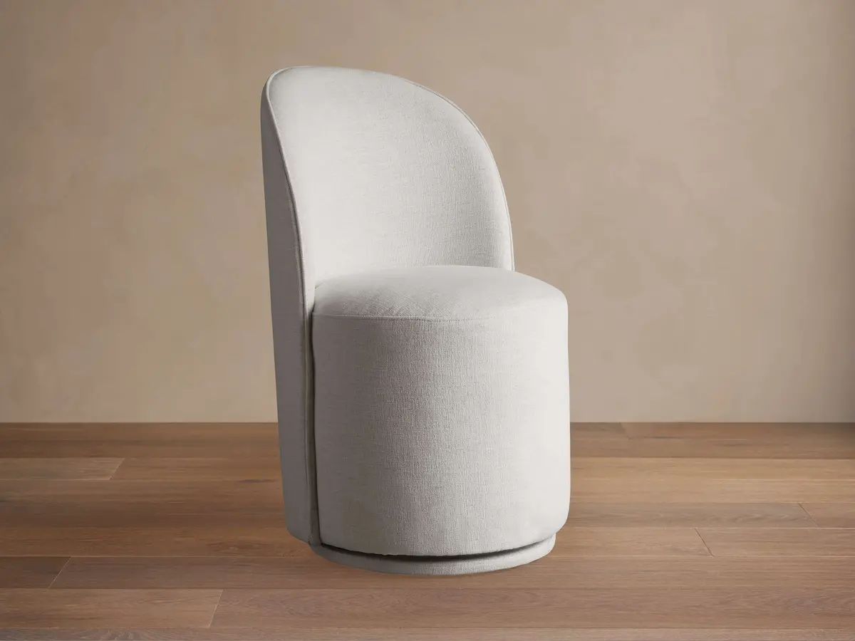 Kira Swivel Dining Chair In Nomad Snow 1