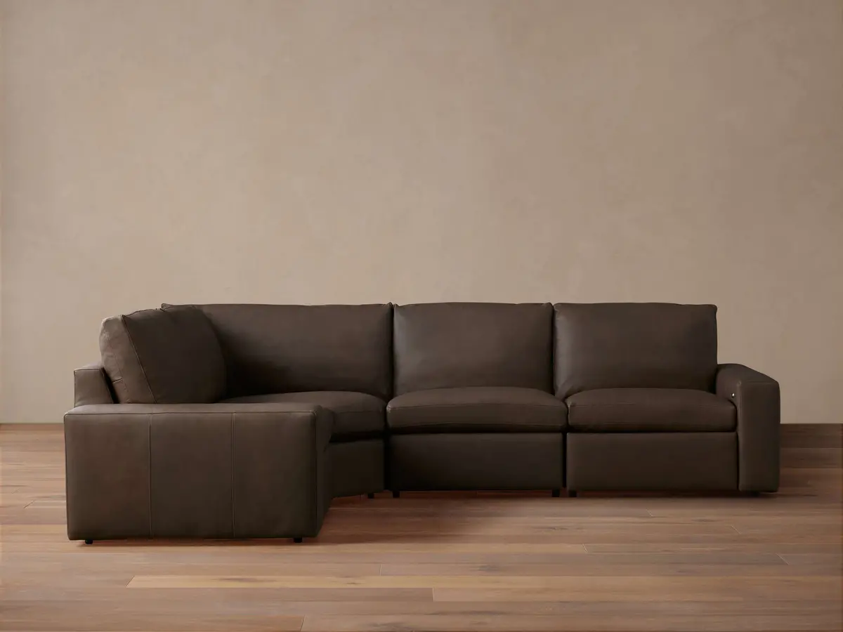 Kipton Wide Arm Leather Four-Piece Motion Sectional 1